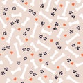 Seamless pattern design with dog paw traces, bone silhouettes and heart shapes isolated on white background.