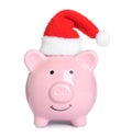 Cute piggy bank with Santa hat Royalty Free Stock Photo