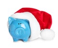 Cute piggy bank with Santa hat Royalty Free Stock Photo