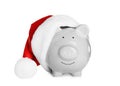 Cute piggy bank with Santa hat Royalty Free Stock Photo