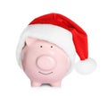 Cute piggy bank with Santa hat