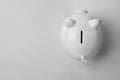 Cute piggy bank on white background, top view