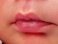Cute pink babys lips close