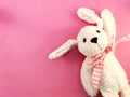 Cute pink dog doll with pink polka dot background Royalty Free Stock Photo