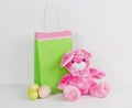 Polka Dot Lime Green and Pink Gift Bag with Pink Stuffed Toy. . Isolated. Easter. Spring. Royalty Free Stock Photo