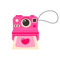 Cute pink retro photo camera with strap. Photo snapshot with a heart.