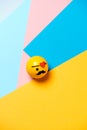 Cute pirate and eye patch and mustache - emoticon, emoji - on a modern colorful geometric background