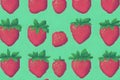 Cute pixel pink strawberry pattern on green background