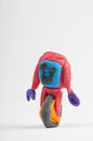 Cute plasticine robot on white background