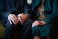 Cute 80 plus year old married couple posing for a portrait in their house. Love forever concept Royalty Free Stock Photo