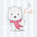 Cute polar bear with scarf walking in the snow Royalty Free Stock Photo