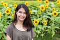 Cute portrait asian Thai teen smile with sunflower Royalty Free Stock Photo