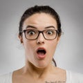 Woman with a astonished expression Royalty Free Stock Photo