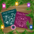 Cute postcards doodle style lie in the texture of the boards. decorated branches of Christmas trees and lanterns