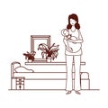 Cute pregnancy mother with little boy seated in bedroom