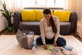 Cute Pregnant Woman Writing Packing List For Maternity Hospital Notebook Prepares Bag. Young Ledy In Pregnancy Have Fun Royalty Free Stock Photo