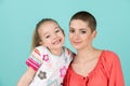 Cute preschool age girl with her mother, young cancer patient in remission. Cancer patient and family support. Royalty Free Stock Photo