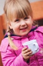 Cute preschool girl with cup