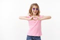 Cute pretty glamour young teenage girl wear sunglasses, pink t-shirt and shorts, love summer camp, adore spent time