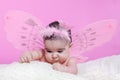 Cute, pretty, happy, chubby baby girl curious about textures Royalty Free Stock Photo