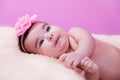 Cute, pretty, happy, chubby baby girl portrait with a big naughty smile Royalty Free Stock Photo