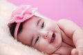 Cute, pretty, happy, chubby baby girl portrait with a big smile, laughing. Royalty Free Stock Photo