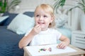 Cute pretty little girl eats candies Royalty Free Stock Photo