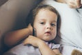 A cute pretty serious baby girl with cell phone Royalty Free Stock Photo