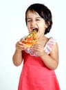 Cute and pretty toddler eating pizza slice
