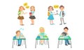 Cute Primary Schools Pupils Communicating and Studying at School, Kids Sitting at Desks at Classroom, School Children Royalty Free Stock Photo