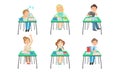 Cute Primary Schools Pupils Sitting at Desks at Classroom, Kids on School Lesson, School Children Characters Studying at Royalty Free Stock Photo