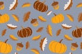 Cute pumpkins and leaves seamless vector pattern