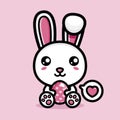 Cute rabbit cartoon character sitting holding an easter egg