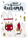 Cute rabbit is in fashionable clothes and is heated by the fire. Fall, autumn illustration. Vector Royalty Free Stock Photo