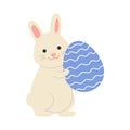 Cute rabbit holding painted Easter egg. Easter holiday. Cartoon vector illustration Royalty Free Stock Photo