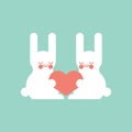 Cute rabbits and love. Hares and heart Royalty Free Stock Photo