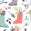 Cute rain boots with flowers and gardening tools seamless pattern Royalty Free Stock Photo