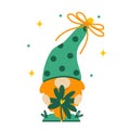 A cute red-bearded dwarf holds a quatrefoil in his hands for good luck. Irish gnome in a hat with polka dots, with a