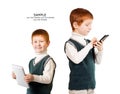 Cute red haired child poses with tablet pc and smartphone. Isola