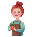 A cute red-haired woman or girl holding a pot with a flower or plant in her hands. Gardening Royalty Free Stock Photo