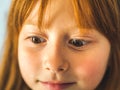 Cute redhead little girl. Funny expression Royalty Free Stock Photo