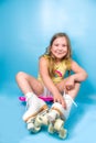 Cute roller girl with quads skates