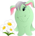 Cute, sad donkey looking at flowers Royalty Free Stock Photo
