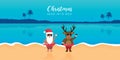 cute santa and deer with sunglasses on paradise beach summer christmas holiday Royalty Free Stock Photo