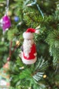 Cute Santa Ornament Decoration in Christmas Tree Royalty Free Stock Photo