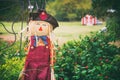 Scarecrow in the autumn garden Royalty Free Stock Photo