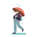 Cute schoolboy kid walking under umbrella in rainy weather with backpack to school Royalty Free Stock Photo