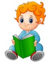 Cute schoolboy reading a book Royalty Free Stock Photo