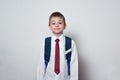 Cute schoolboy with school uniform on white background. Middle School, Junior High School