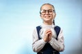 Cute Schoolgirl In Glasses Smile Implore Gesture